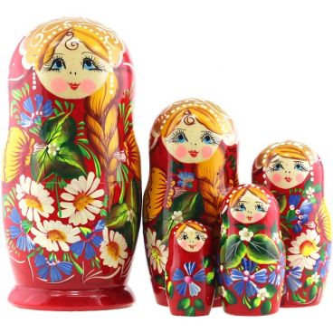Matryoshka 5 places red daisies with a scythe