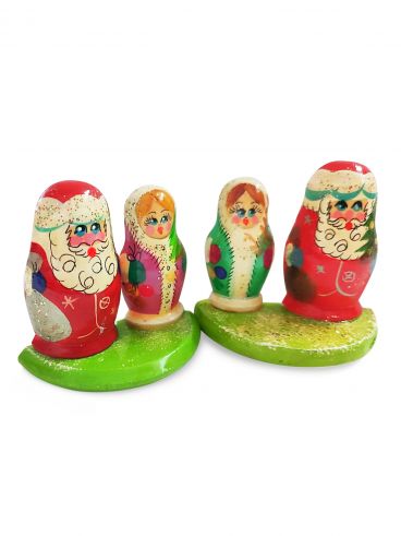 Magnet-half Santa Claus and Snow Maiden